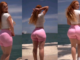 Gorgeous lady engages her fans with her beachside walk around (Video)